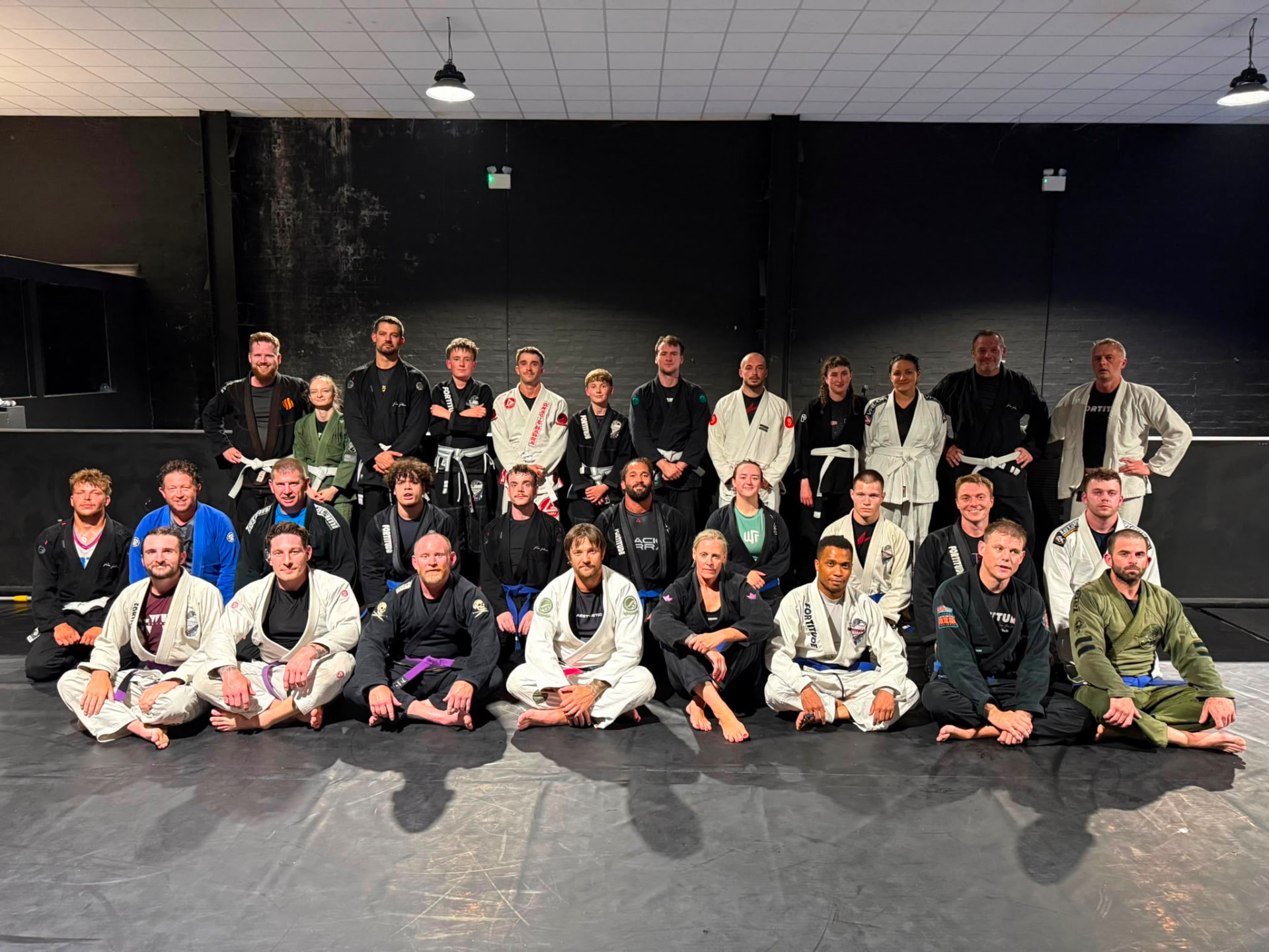 The Fortitude BJJ Ipswich team lined up on the mats after class